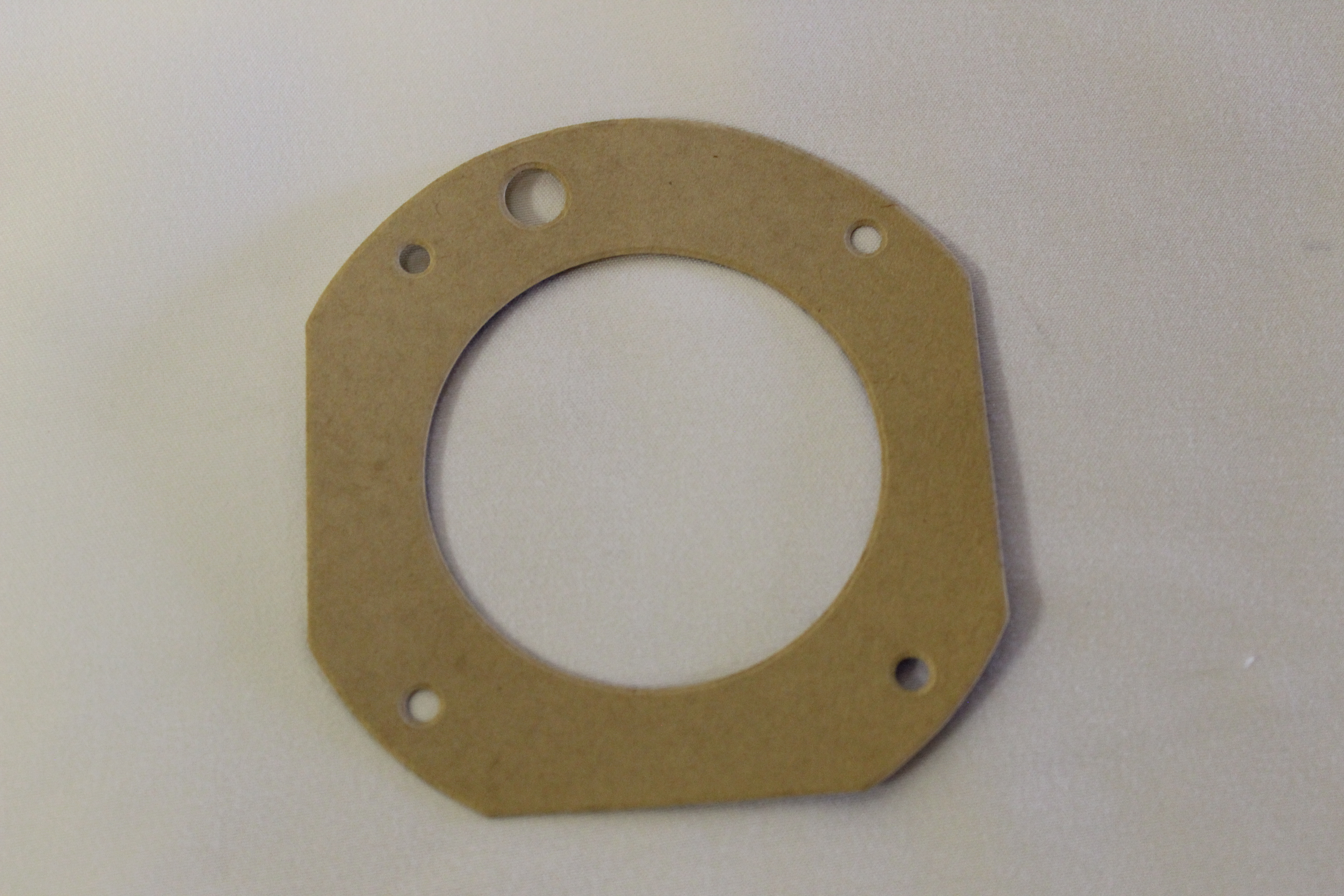 Dichtung zwischen Bremsträger und Kappe