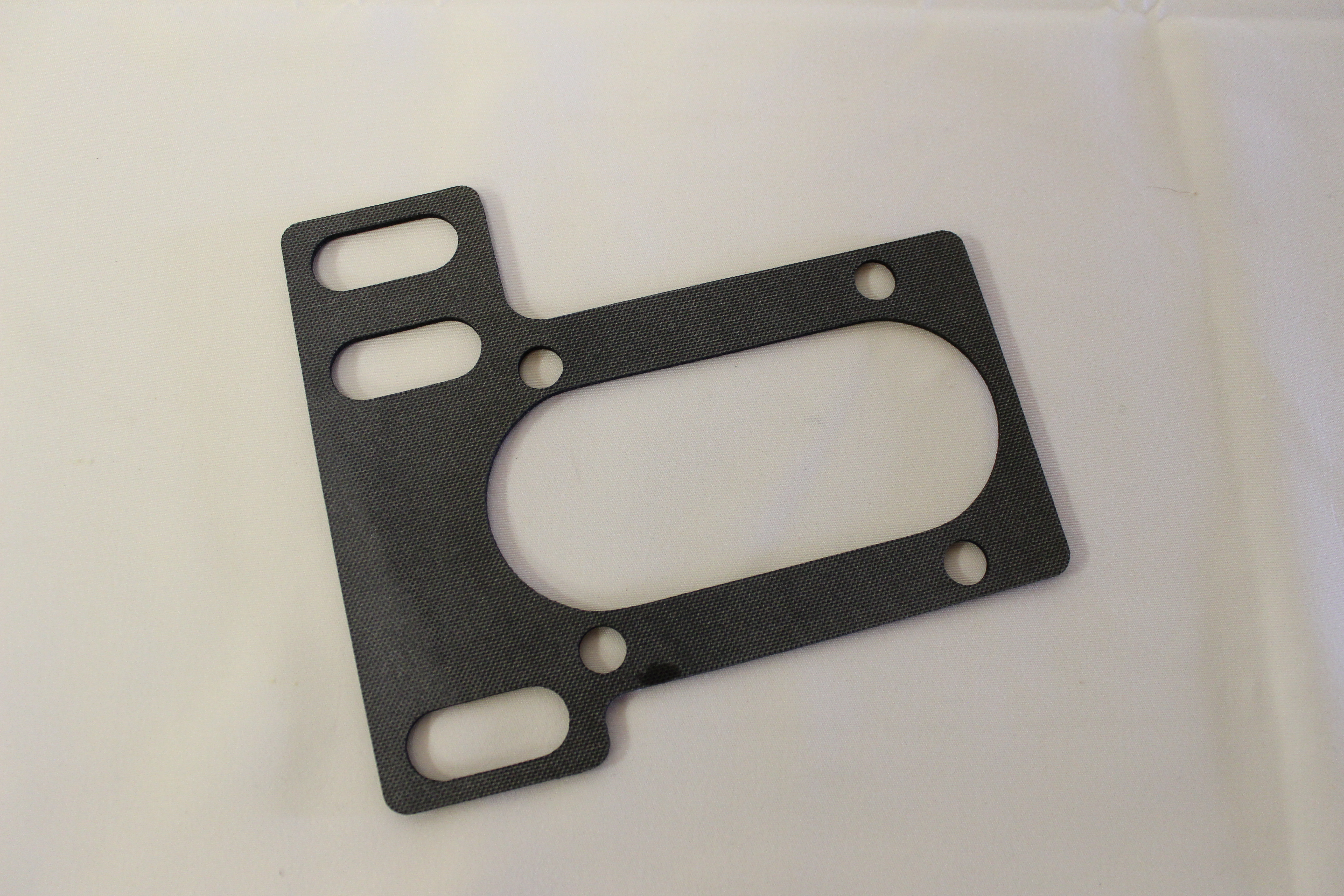 Gummidichtung zwischen Karosse und Rahmen