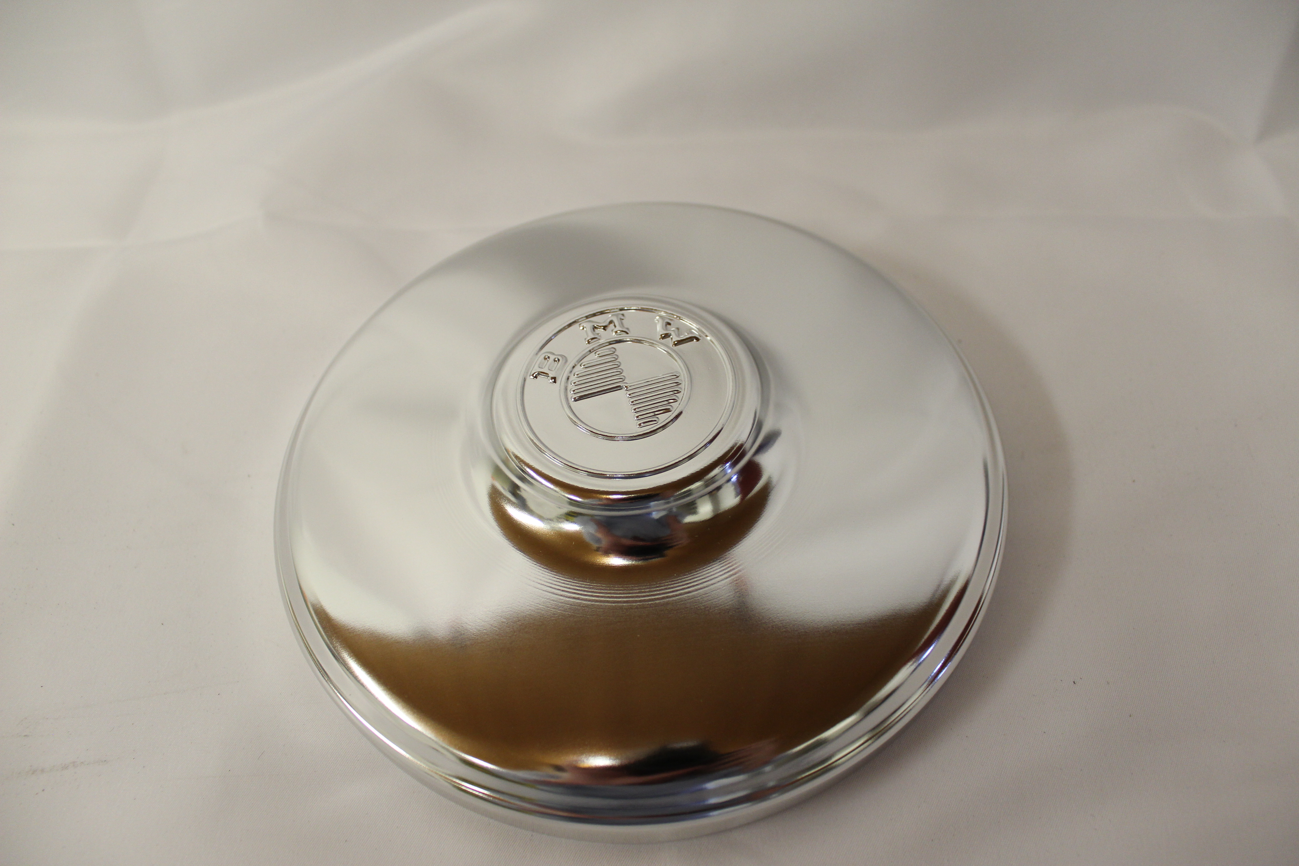 Radkappe bis BJ58, zentrale Erhebung