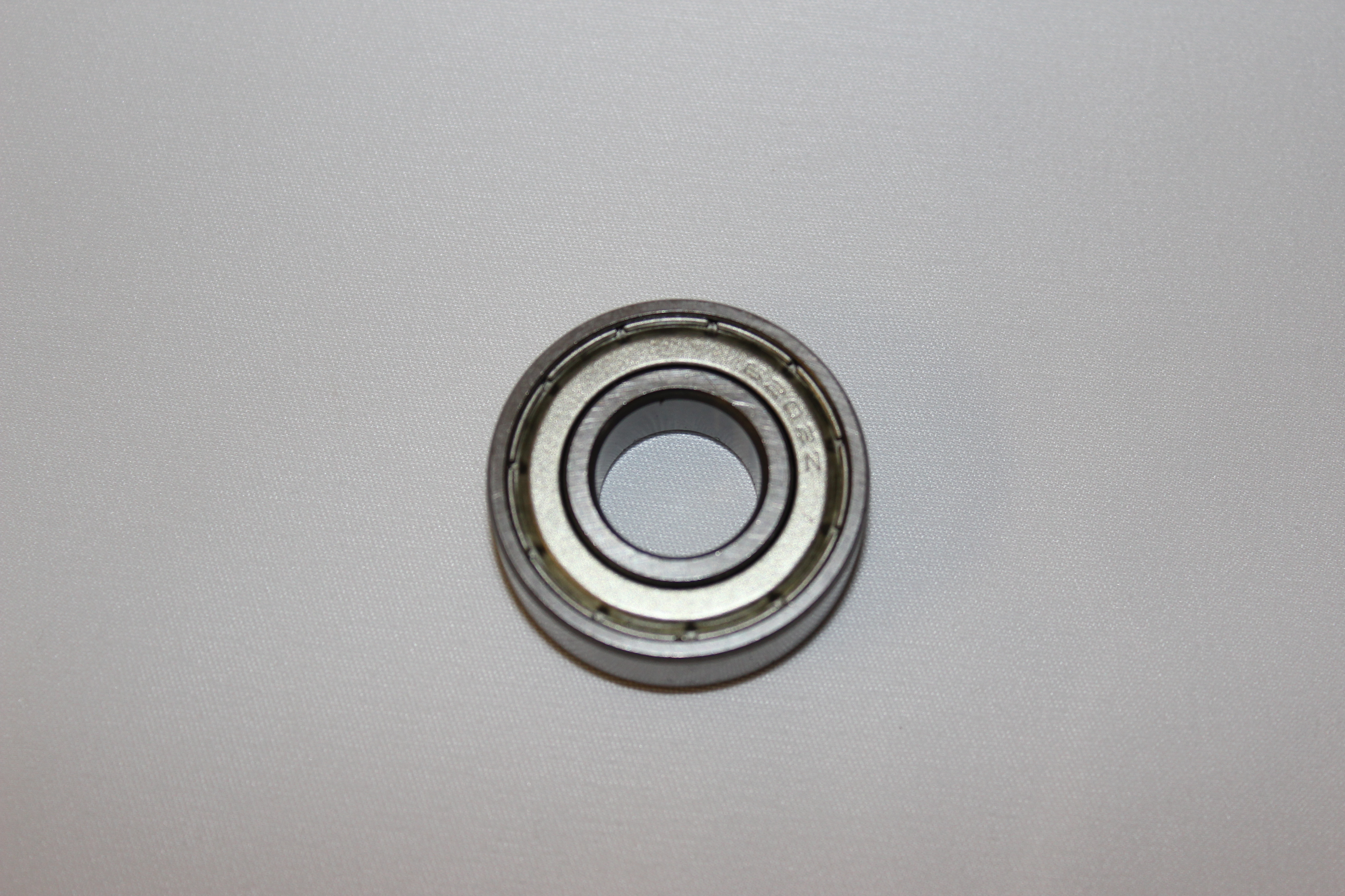 Kugellager 6202 auf Kettenspannplattseite